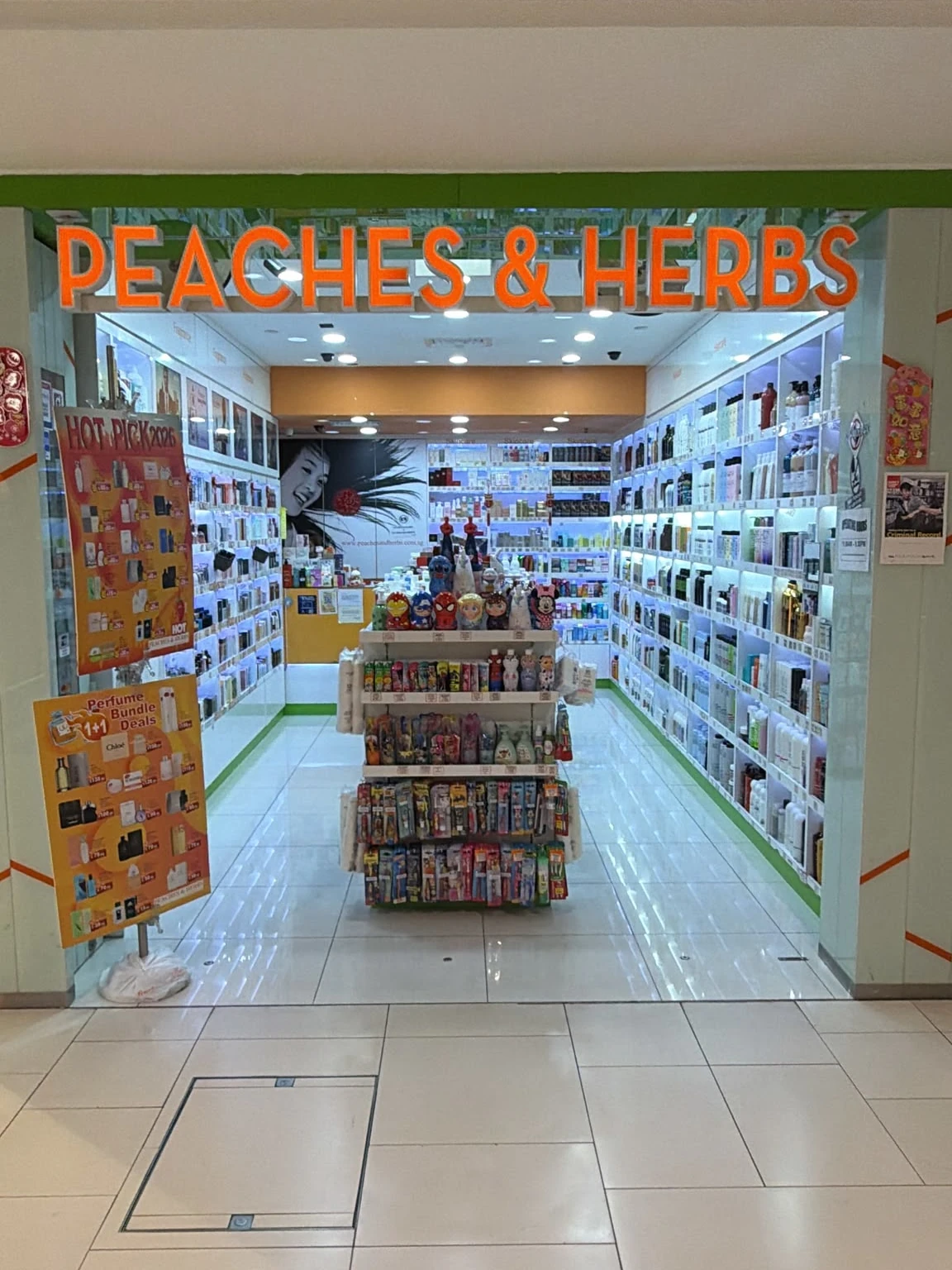 Peaches and Herbs storefront and product displays